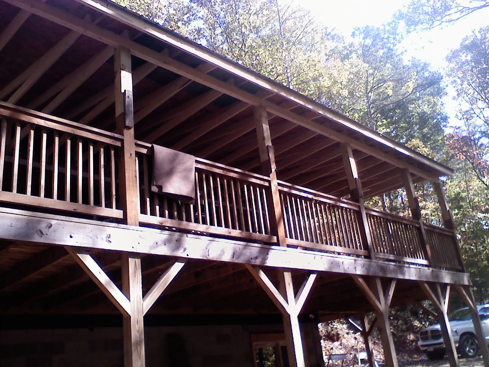 Timber framing under a new elevated porch and deck — Roof Leak Repair in Norlina by Roofing Brothers